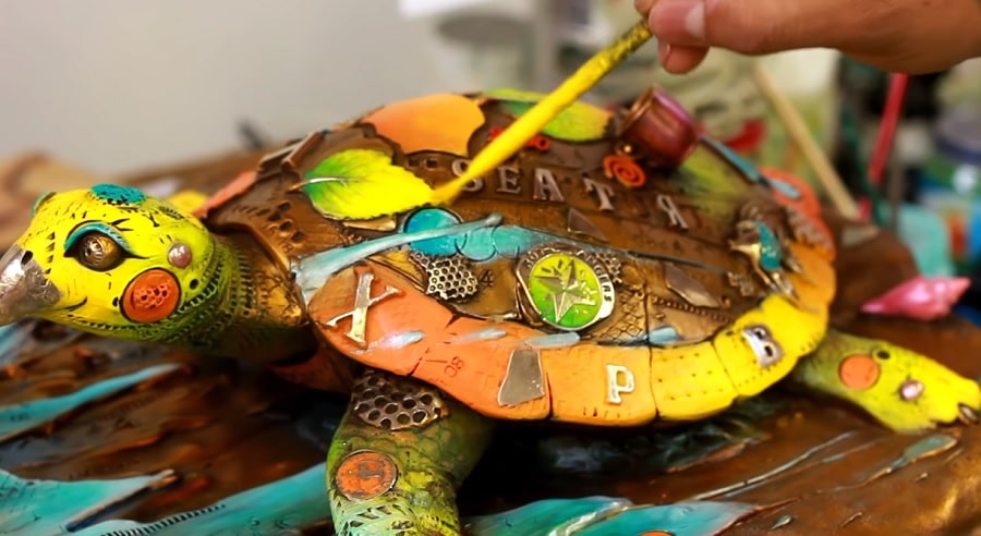 Patinas are hand-painted into the sculptures and then cooked on with a blowtorch.