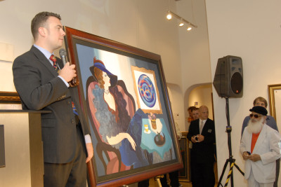 Rob auctioning at a special event featuring artist Yaacov Agam. Photo credit: Brent Plaxton